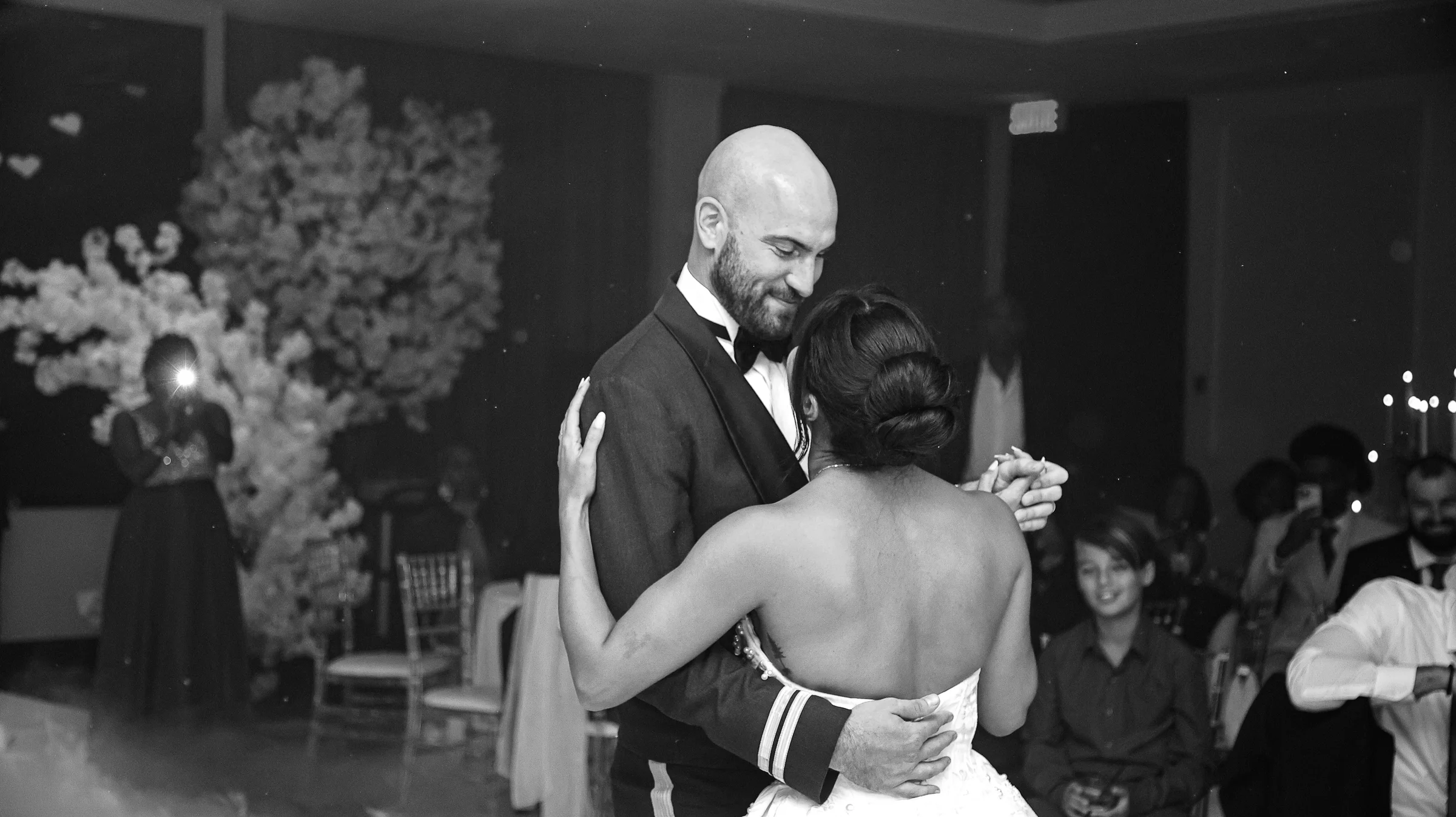 Reception candid — authentic joy